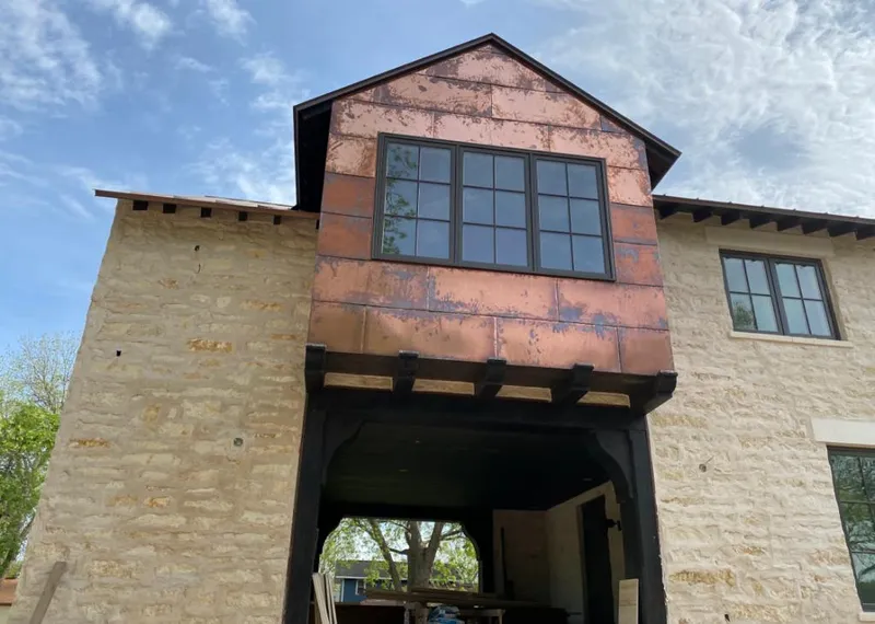 Copper metal panel facade on a stone building for Metal Roof Coating in San Leon